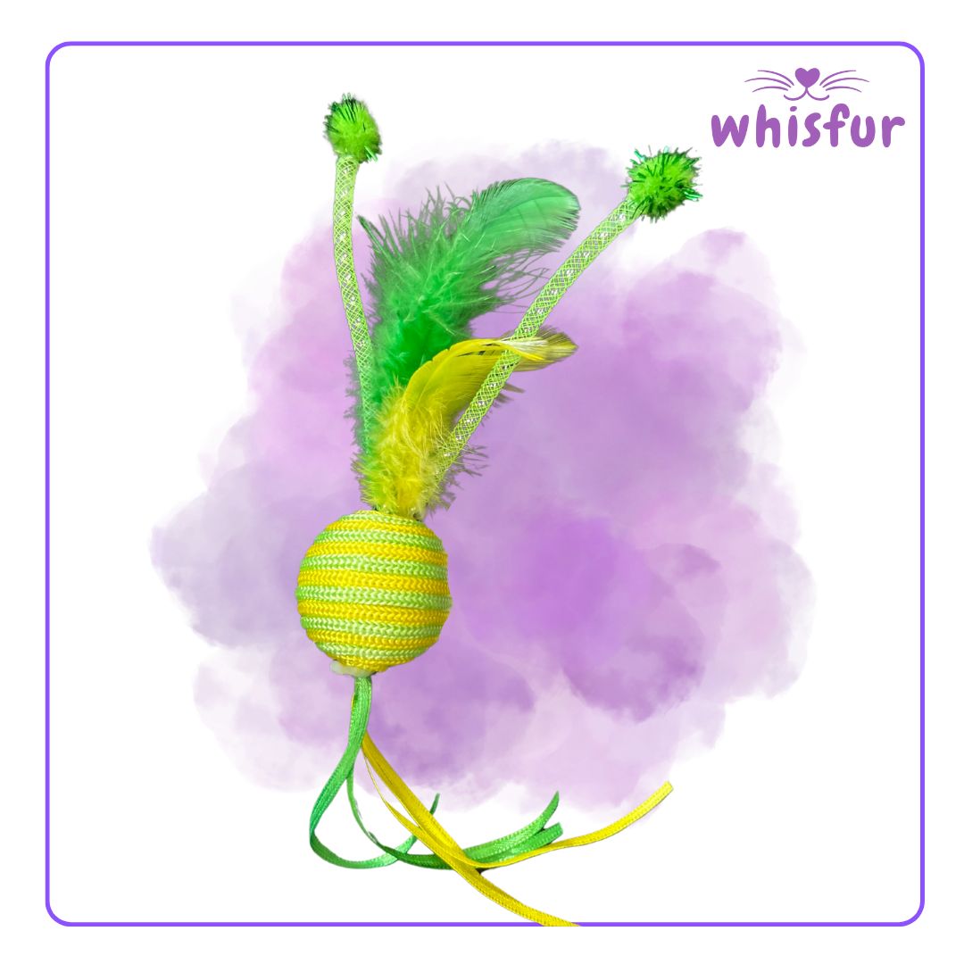 Cat toy with green feathers and a yellow ball on a purple watercolor background, branded 'Whisfur'.