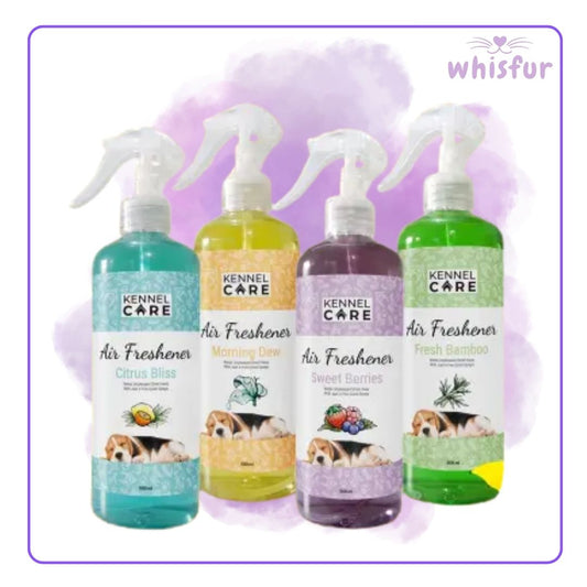 Four bottles of Kennel Care air fresheners with colorful labels on a light purple background, branded 'whisfur'.