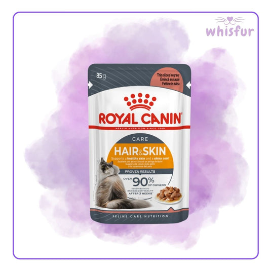 Royal Canin Hair & Skin care cat food pouch on a purple background, branded 'whisfur'.