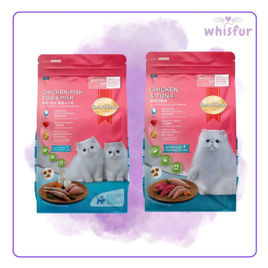 Two packages of Smart Heart cat food with white cats on the label, branded 'whisfur'.