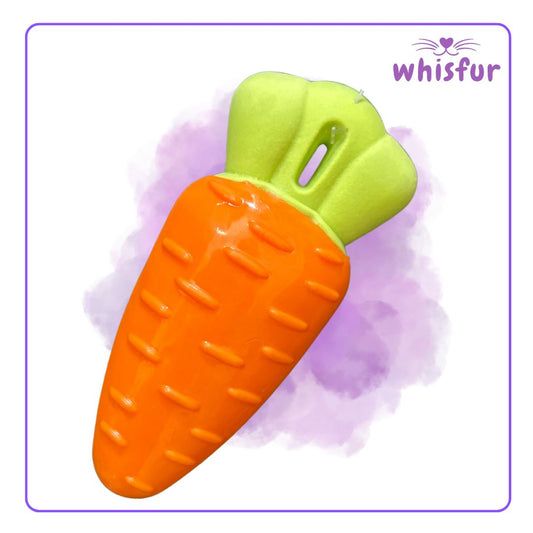 Carrot-shaped dog toy with green top on a light purple background, branded 'Whisfur'.