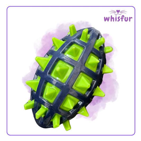 Green and black textured ball with spikes on a light purple background, branded 'Whisfur'.