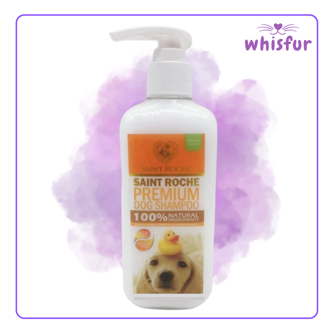 Saint Roche Premium Dog Shampoo bottle with a purple bath sponge in the background, branded with Whisfur.