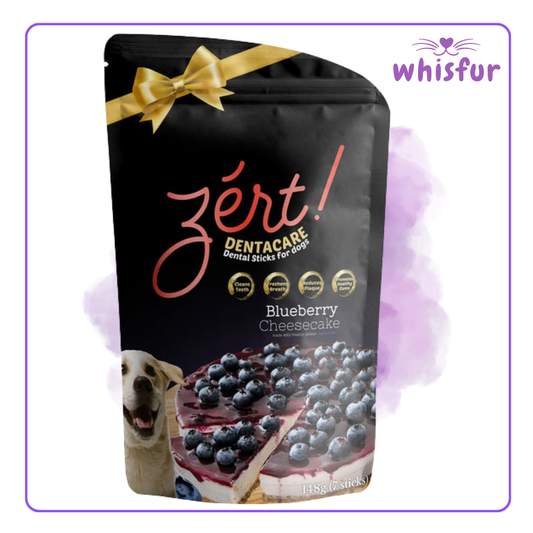 Zért! Dentacare Blueberry Cheesecake dental sticks packaging for dogs with a gold bow on a white background, branded 'whisfur'.