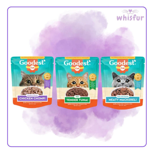 Three packages of Goodest cat food with a purple cloud background and 'whisfur' branding.
